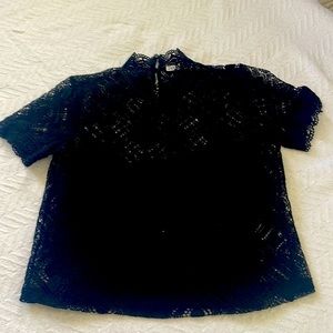 Zara black top. Perforated style with blak breathable lining. Stunning pattern!